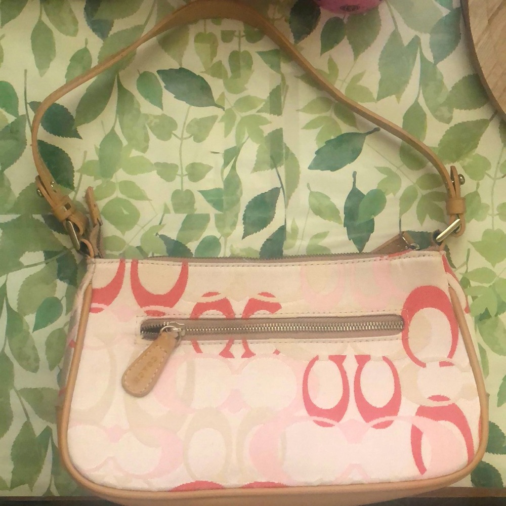 A pink coach bag